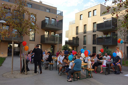 Outdoor gathering amongst newly built homes