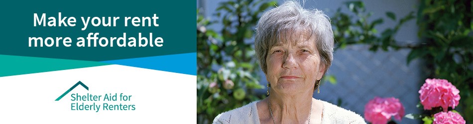 older white woman with grey hair outside in garden