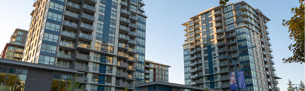 soft, golden light across two apartment buildings