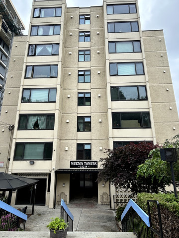 A narrow eight-storey apartment building.