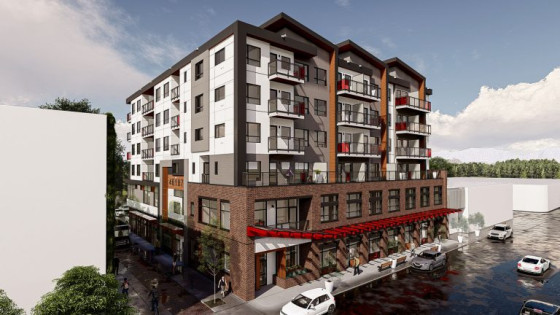 Rendering of a six-storey white and grey building with ground-level businesses at the front.