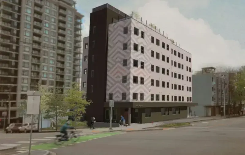 Architectural rendering of a mid-rise residential building with a patterned façade at a street corner, featuring ground-floor entrances, pedestrians on the sidewalk, a cyclist in a bike lane, and surrounding urban buildings.